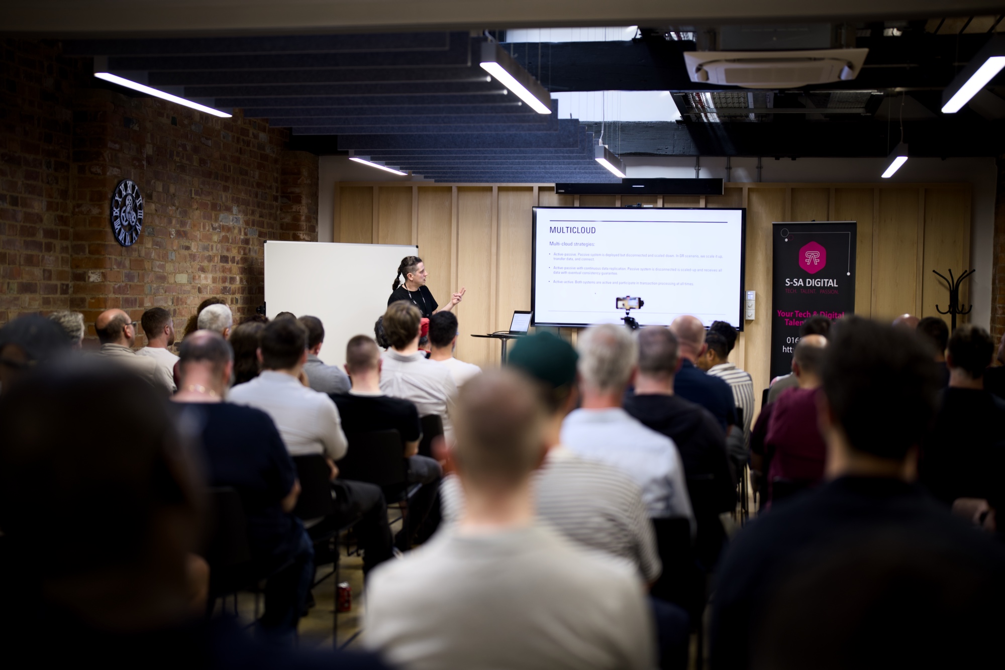 Jacek presenting at the NN1 Dev Club #12